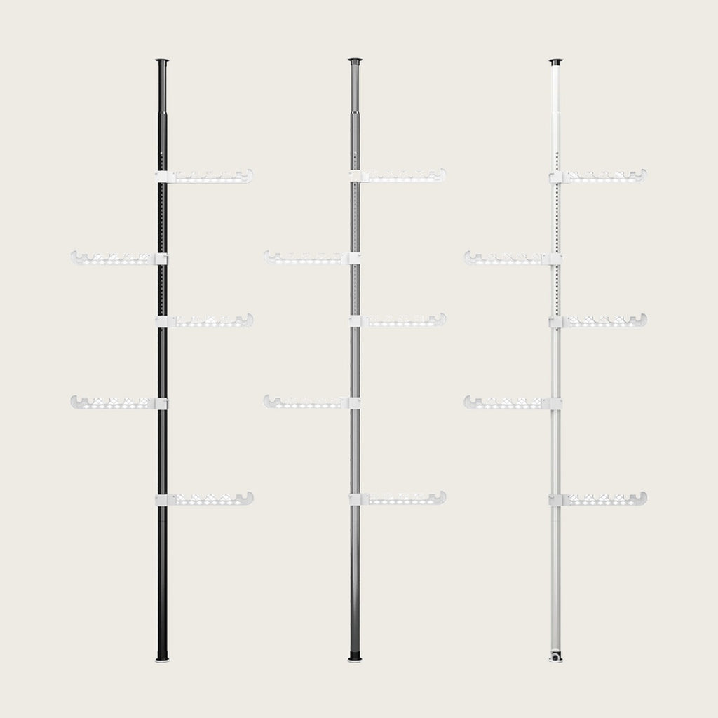 Floor-to-ceiling tension clothes rack in black, grey and white