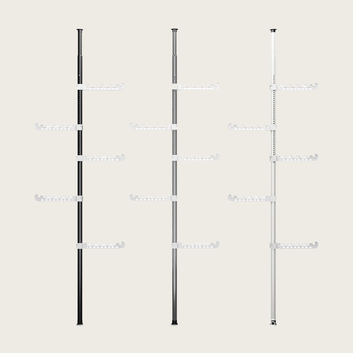 Floor-to-ceiling tension clothes rack in black, grey and white