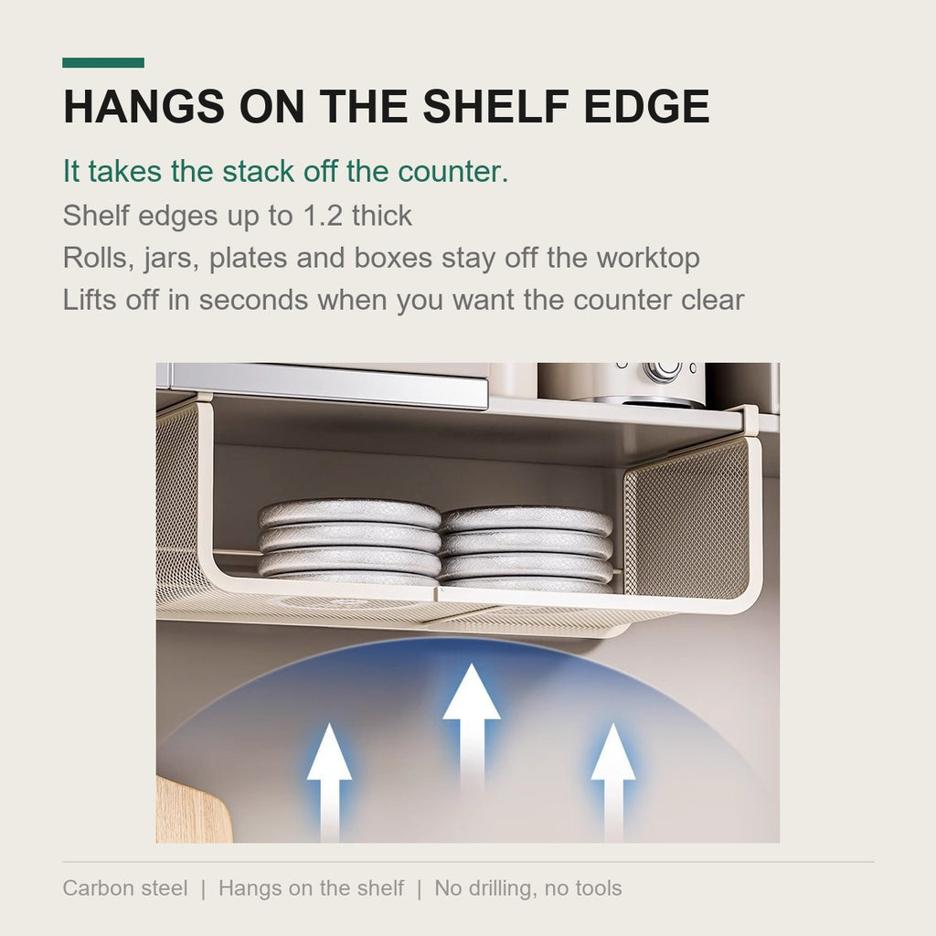 The basket hung on a shelf edge, holding a stack of plates