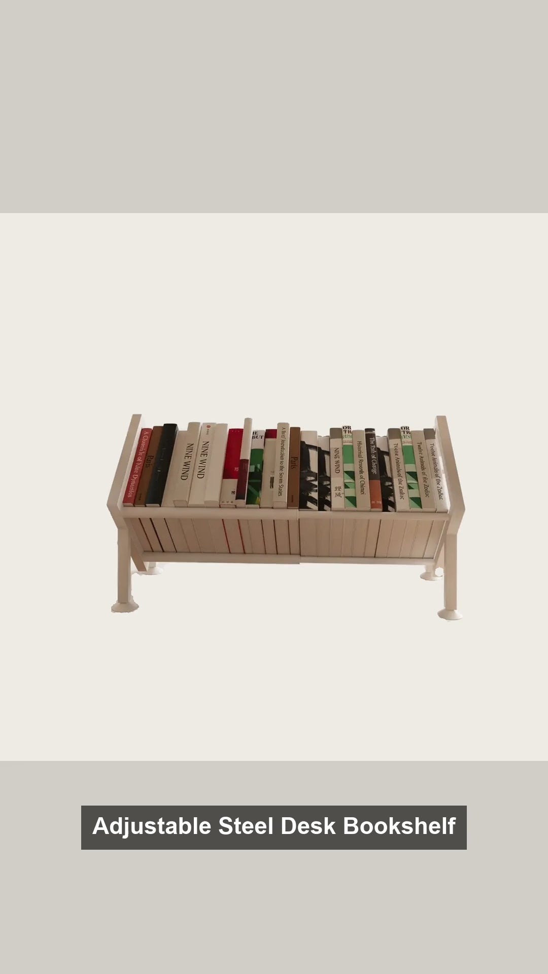 Adjustable steel desk bookshelf expanding from 29.5 to 48.5 cm on a wooden desk